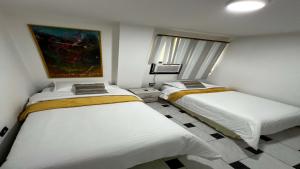 resized-dormitorio-camas-individuales-apartamento-araguaney