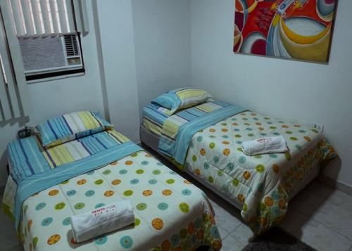 resized-dormitorio-camas-individuales-apartamento-nogal