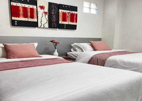 resized-dormitorio-camas-individuales-apartamento-vino-rosso